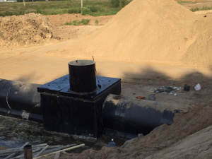 Сооружение водоперепускной трубы на ПК305+00