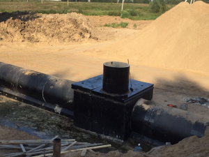 Сооружение водоперепускной трубы на ПК305+00